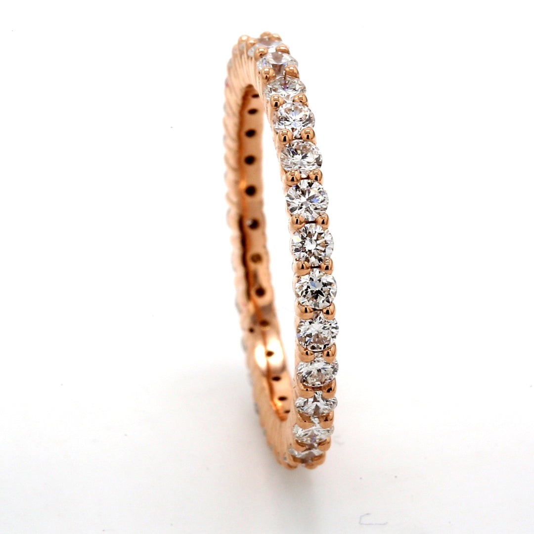 Eternity band in 18K RG with prong set (30) round diamonds.  D0.88ct.t.w.  Size 5