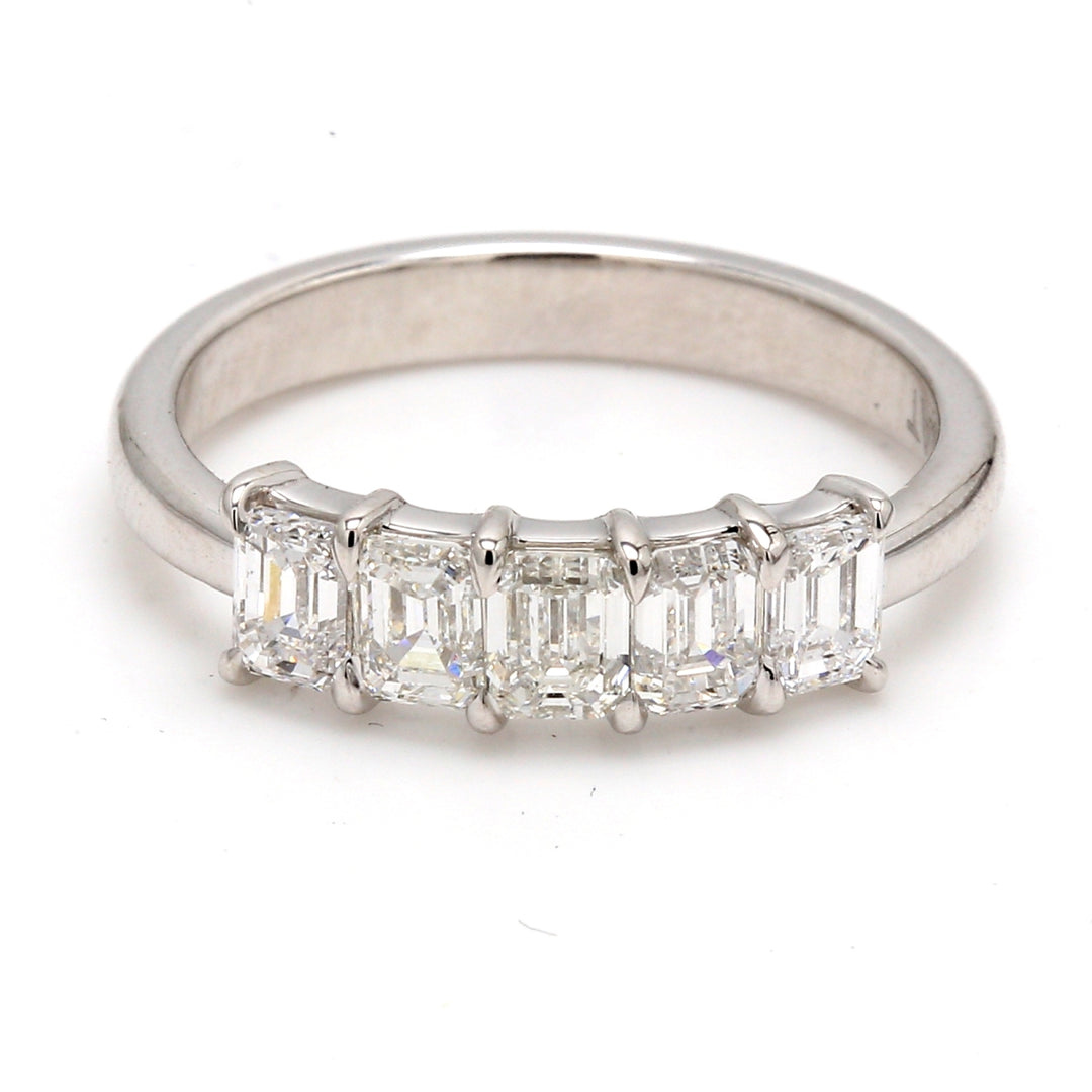 5-stone band in platinum with basket prong set emerald cut diamonds.  D1.30ct.t.w.  Size 6.25