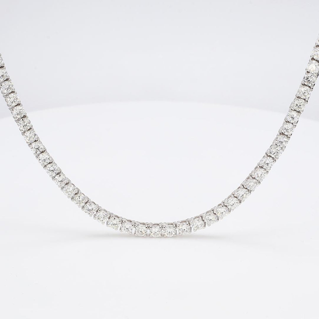 22"" Tennis necklace in 18K WG with 4-prong set round diamonds.  D19.76ct.t.w.