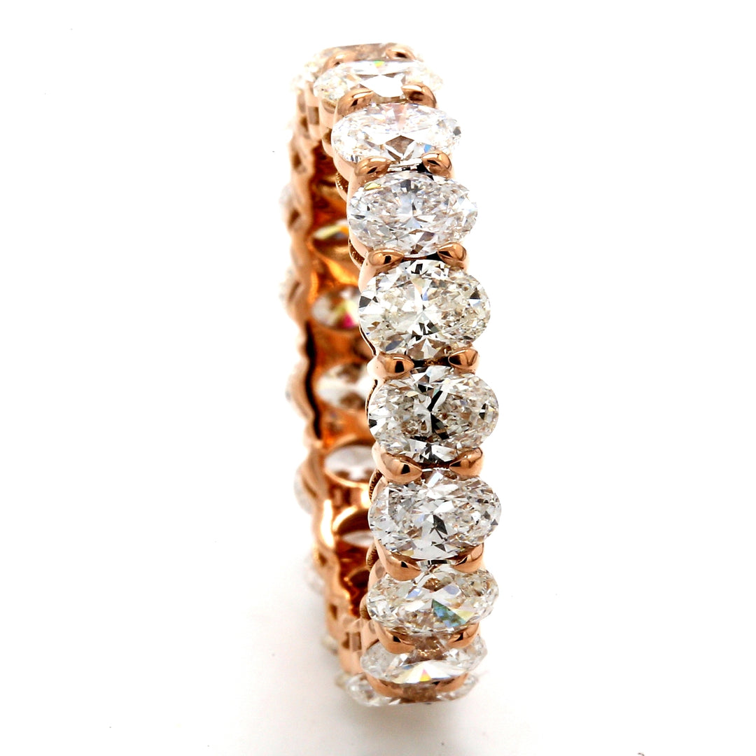 Eternity band in 18K RG with basket U-prong set (19) oval cut diamonds.  D4.47ct.t.w.  Size 6.5