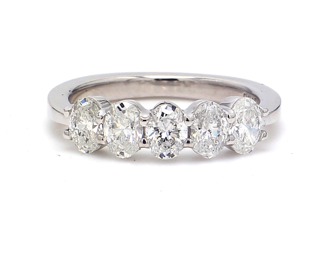 5-stone band in platinum with basket prong set oval cut diamonds.  D1.17ct.t.w.  Size 5.5