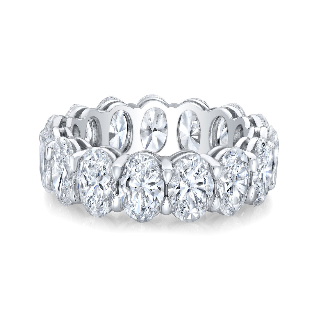 Eternity band in platinum with basket prong set (18) oval cut diamonds.  D4.37ct.t.w.  Size 5.5