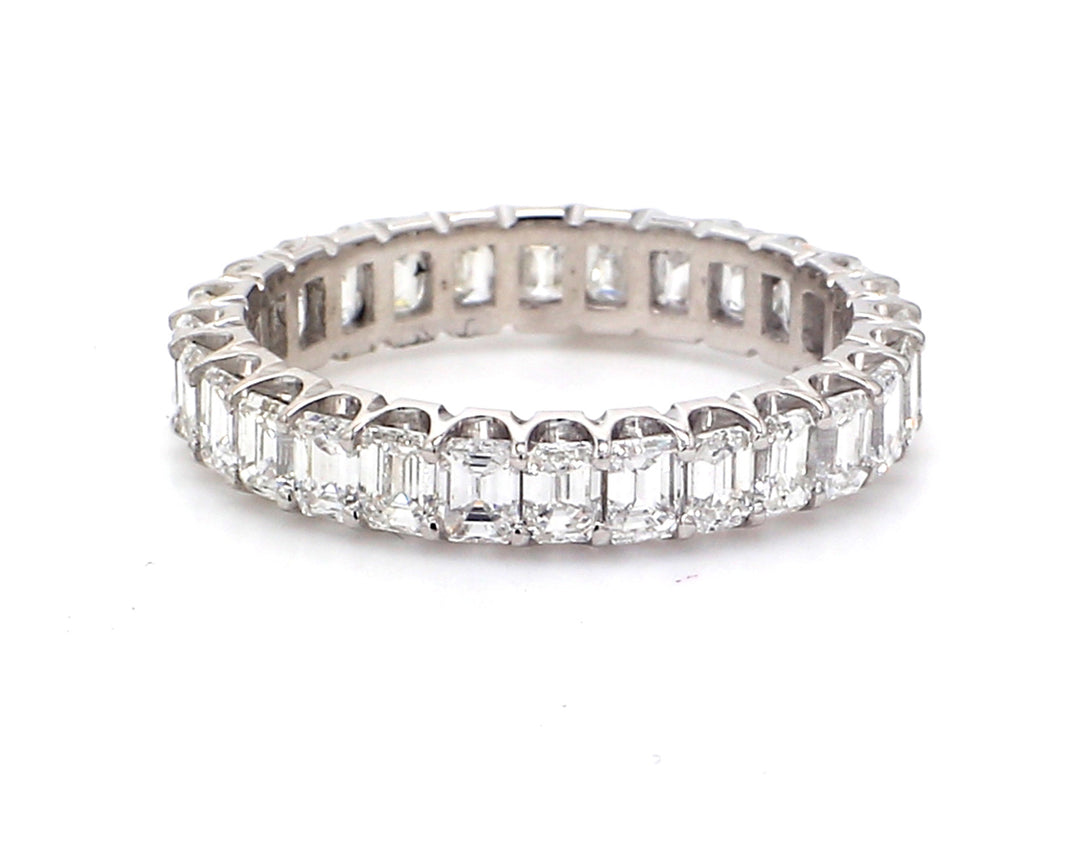 Eternity band in 18K WG with prong set (28) emerald cut diamonds.  D2.38ct.t.w.  Size 5