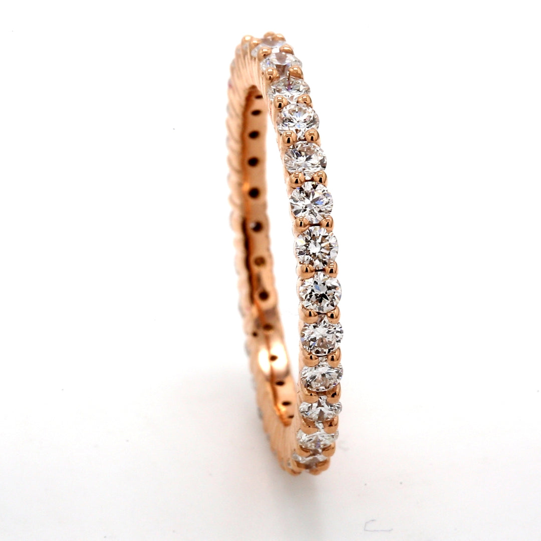 Eternity band in 18K RG with prong set (31) round diamonds.  D0.89ct.t.w.  Size 6