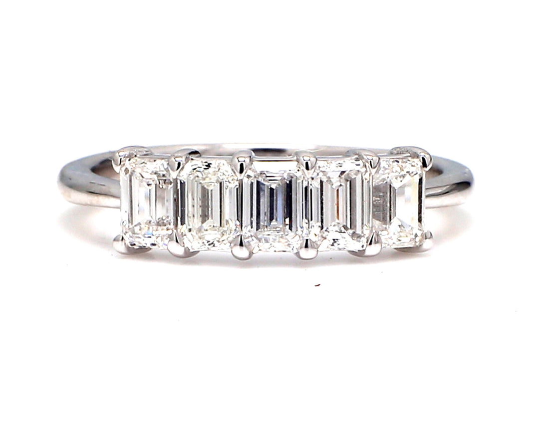 5-stone band in platinum with prong set emerald cut diamonds.  D1.23ct.t.w.  Size 6.5