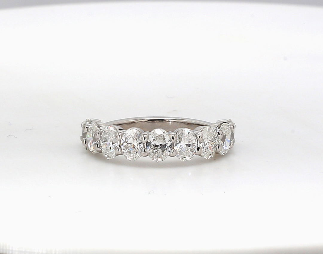 9-stone band in platinum with shared prong basket set oval diamonds.  D2.27ct.t.w.  Size 6