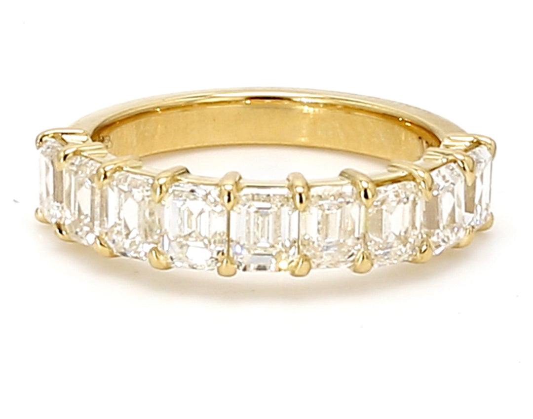 9-stone band in 18K YG with prong set emerald cut diamonds.  D2.14ct.t.w.  Size 5