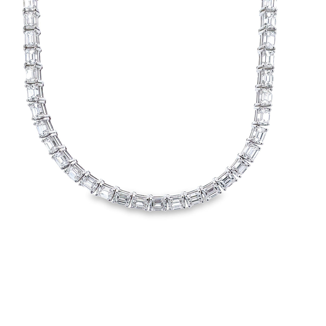 17.25"" Tennis necklace east to west style in 18K WG with 4-prong basket set emerald cut diamonds.  D25.70ct.t.w.