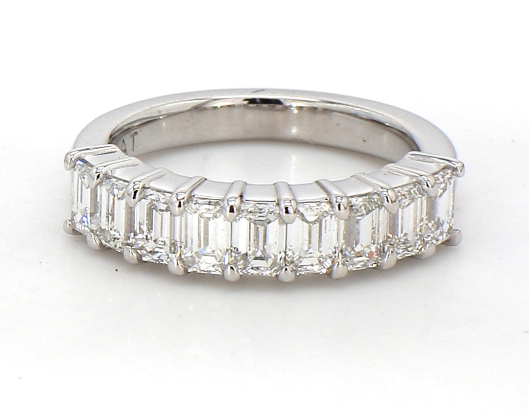 9-stone band in platinum with prong set emerald cut diamonds.  D1.29ct.t.w.  Size 4.5