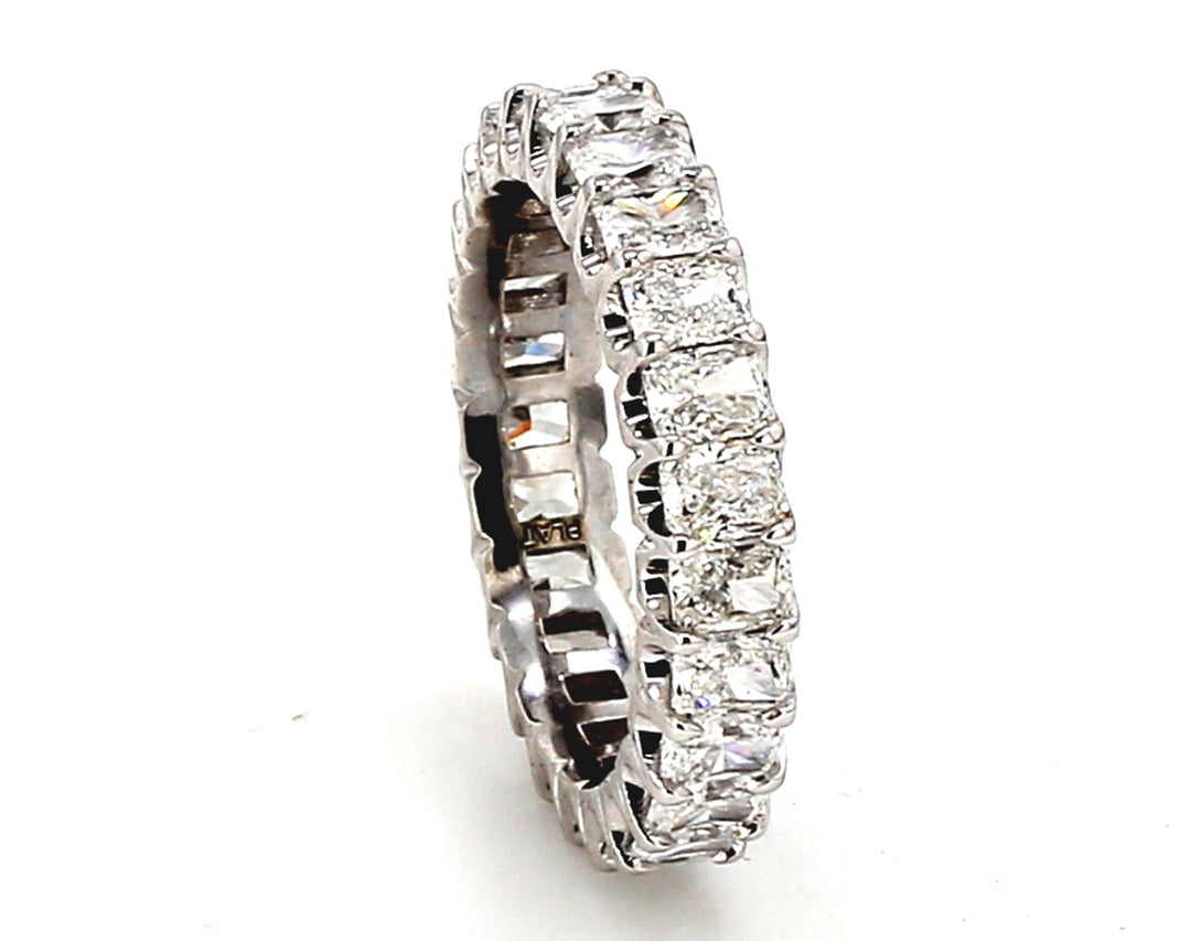 Eternity band in platinum with U-prong set (25) radiant cut diamonds.  D3.74ct.t.w.