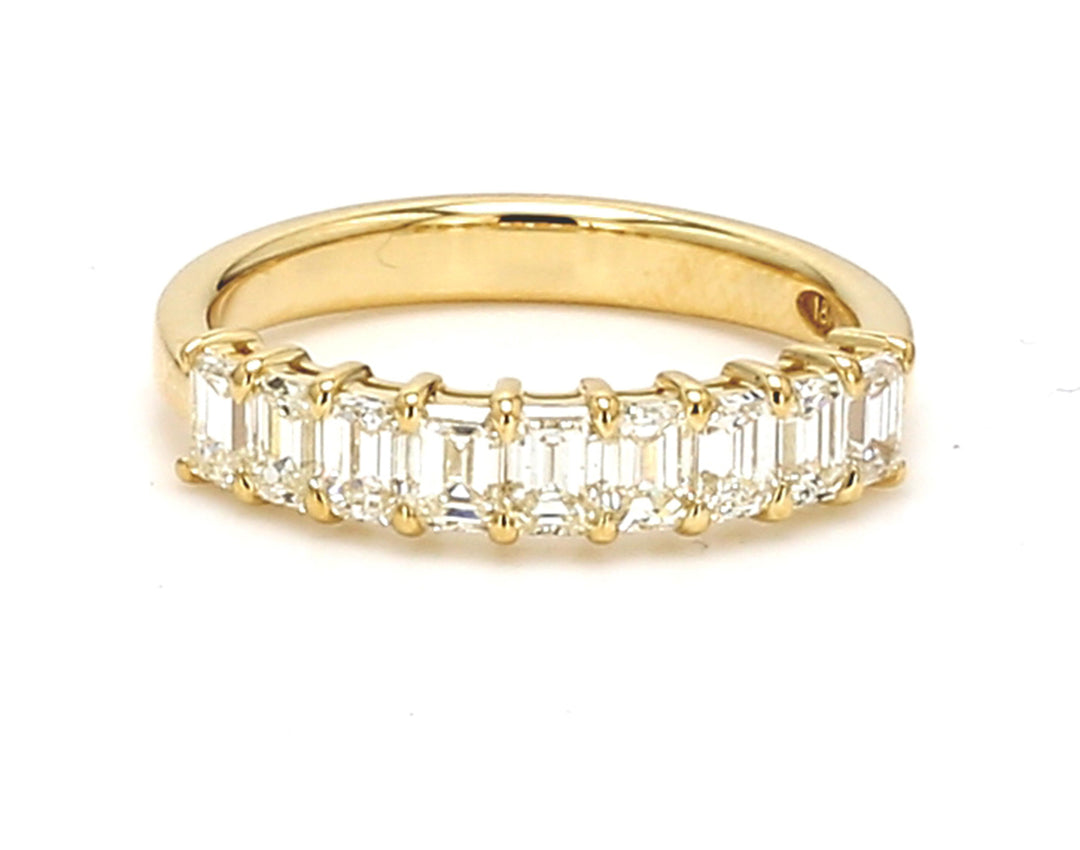 9-stone band in 18K YG with basket prong set emerald cut diamonds.  D0.92ct.t.w.  Size 5