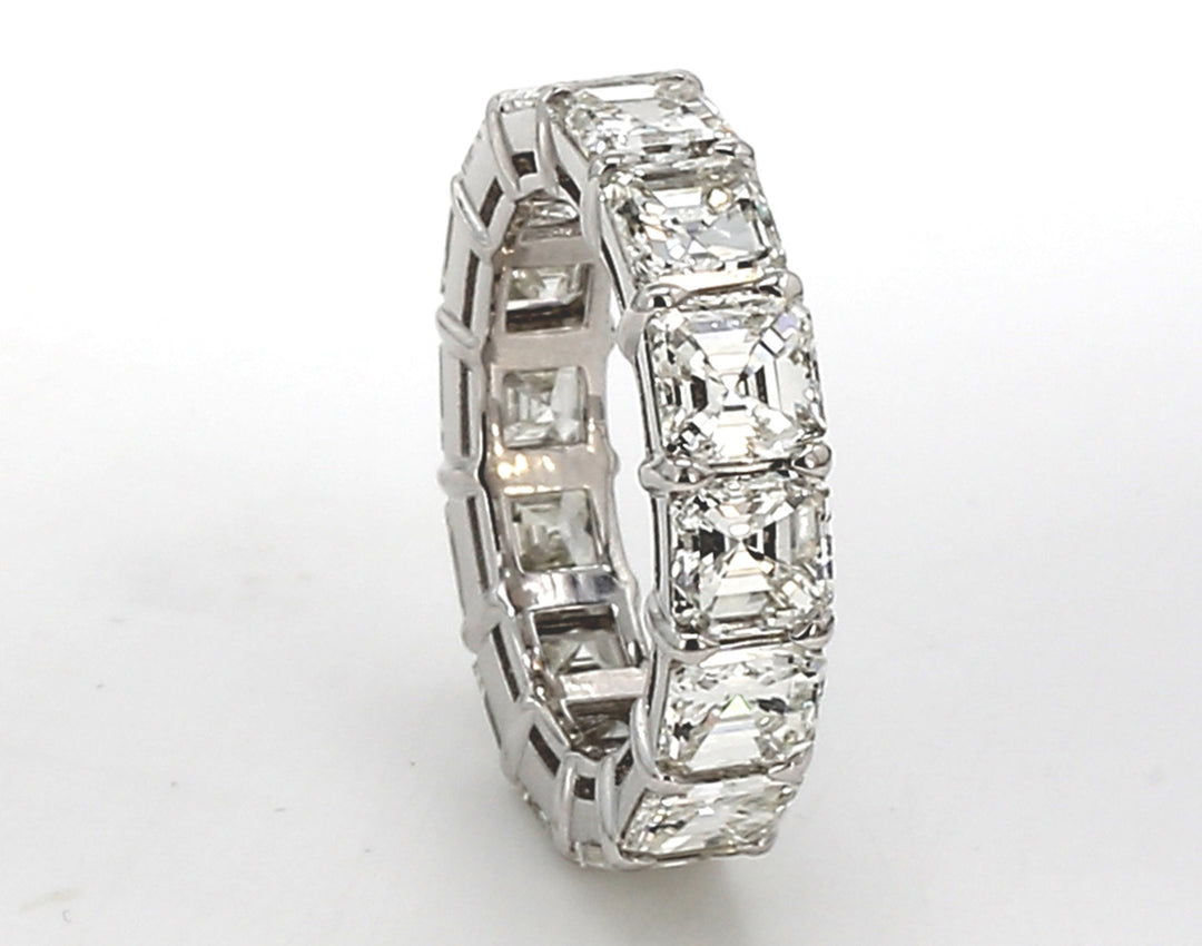 Eternity band in platinum with basket claw prong set (14) asscher cut diamonds.  D5.99ct.t.w.  Size 3.75