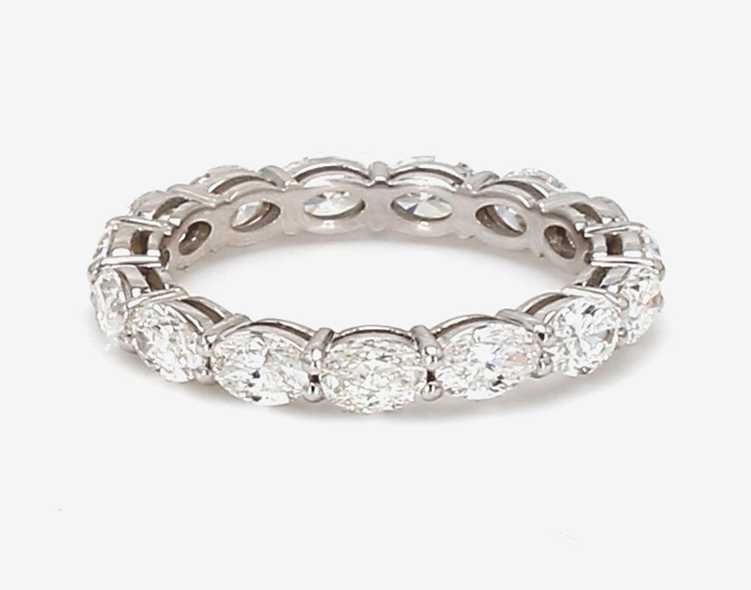 Eternity band east to west style with basket prong set (15) oval cut diamonds.  D2.02ct.t.w.  Size 5.5