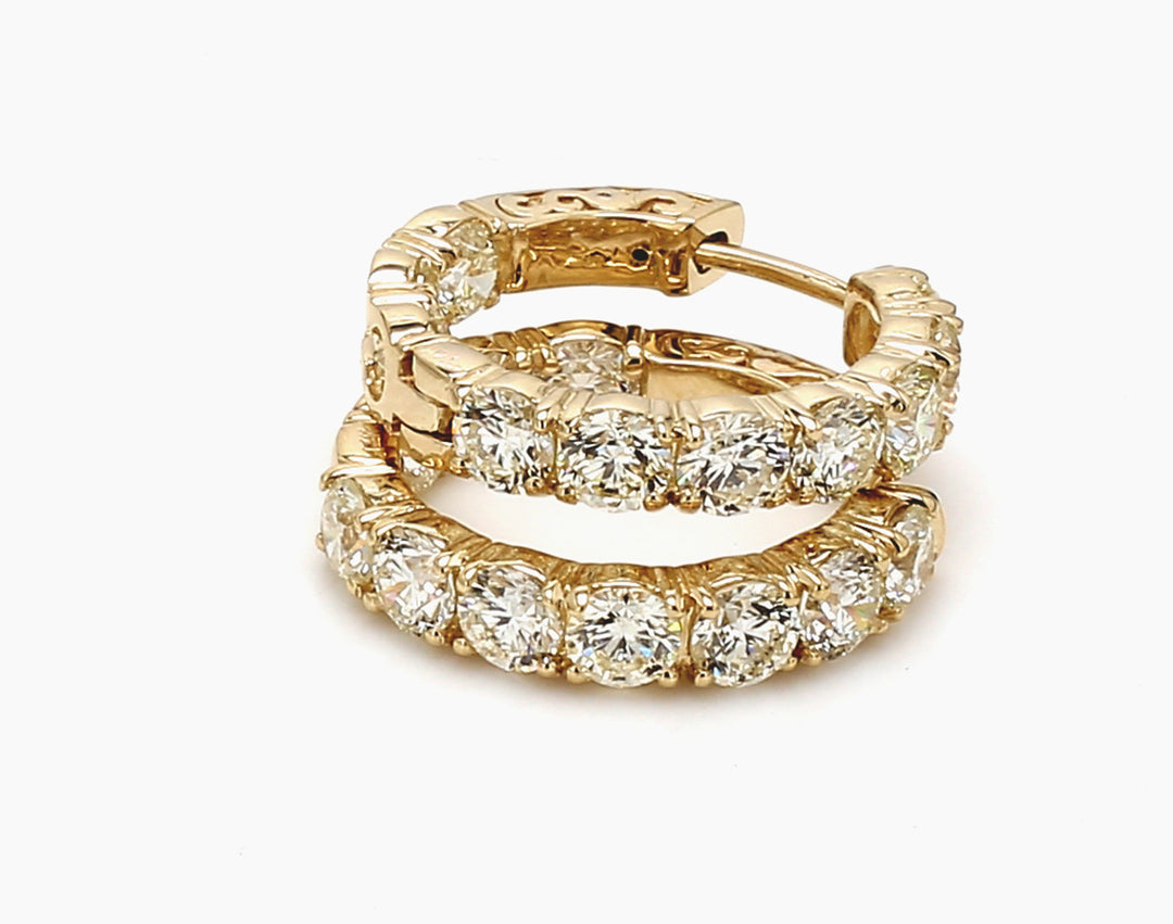 0.50"" Inside out hoop earrings in 14K YG with prong set (20) round diamonds.  D4.71ct.t.w.