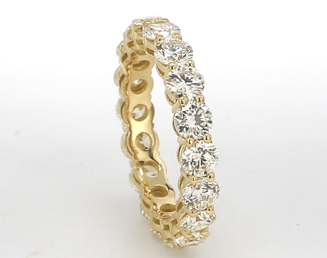 Eternity band in 18K YG with basket prong set (18) round diamonds.  D3.44ct.t.w.  Size 6