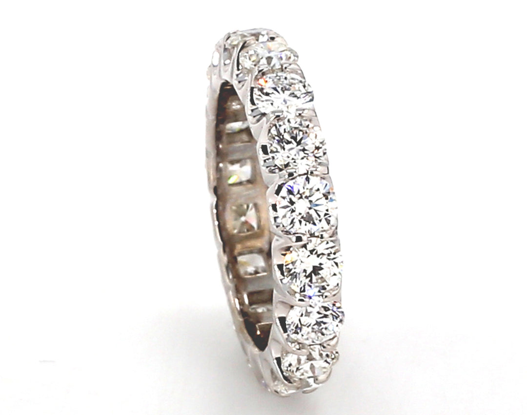 Eternity band in platinum with U-prong set (18) round diamonds.  D3.32ct.t.w.  Size 5.75