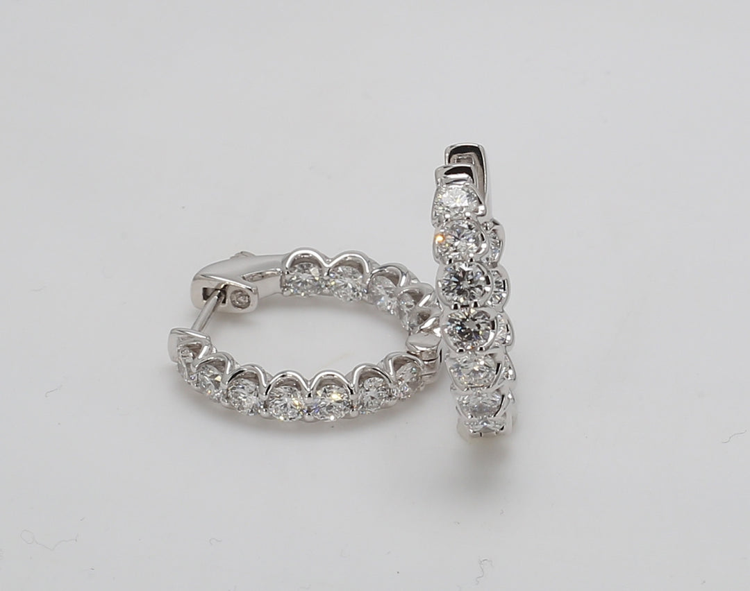 0.75"" Inside out hoop earrings with U-prong set (24) round diamonds.  D2.52ct.t.w.