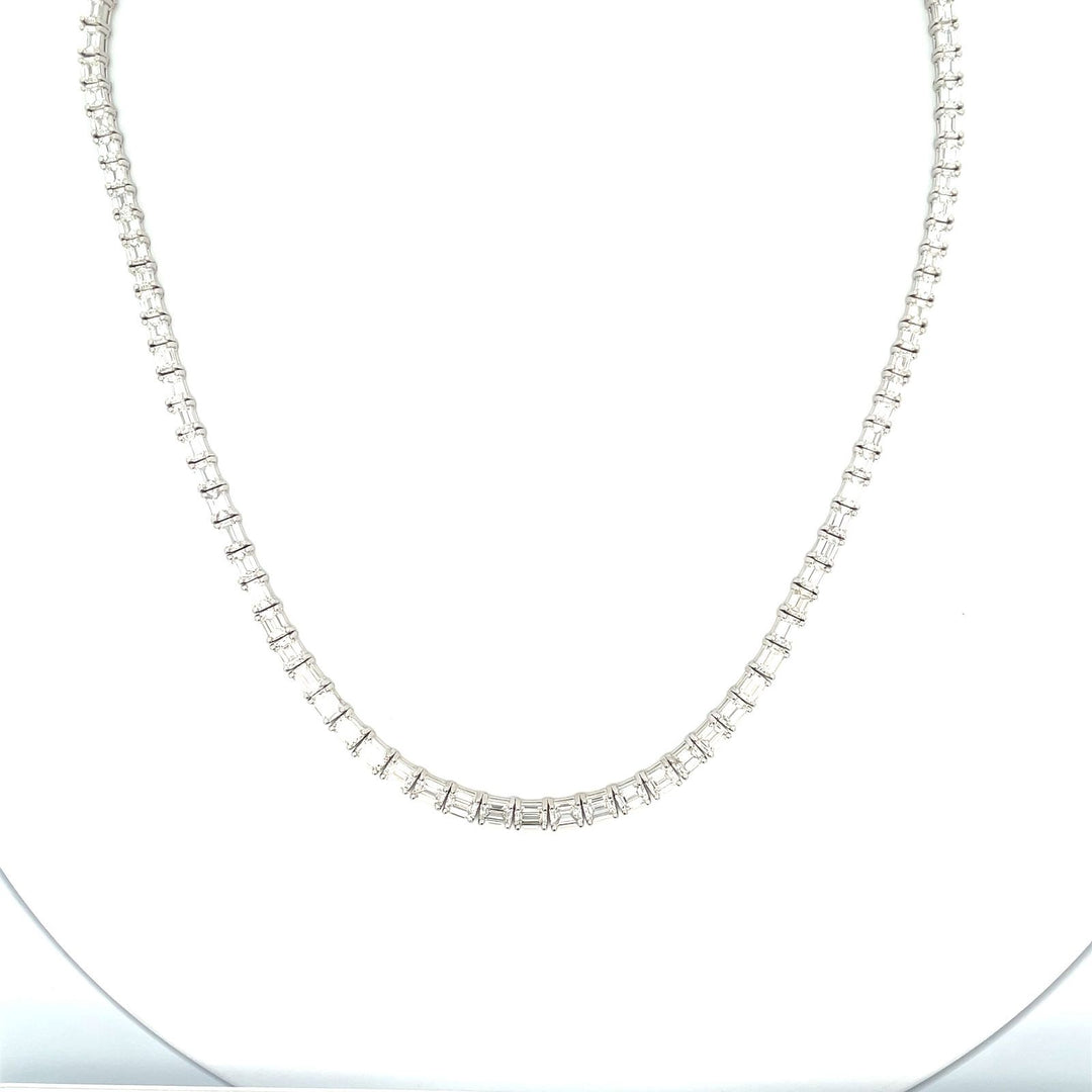 16.5"" Tennis necklace east to west style in platinum with 4-prong set emerald cut diamonds.  D20.91ct.t.w.