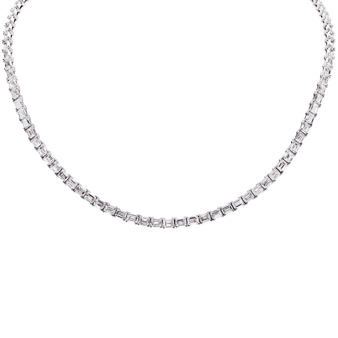 17"" Tennis necklace east to west style in 18K WG with basket prong set (95) emerald cut diamonds.  D28.11ct.t.w.