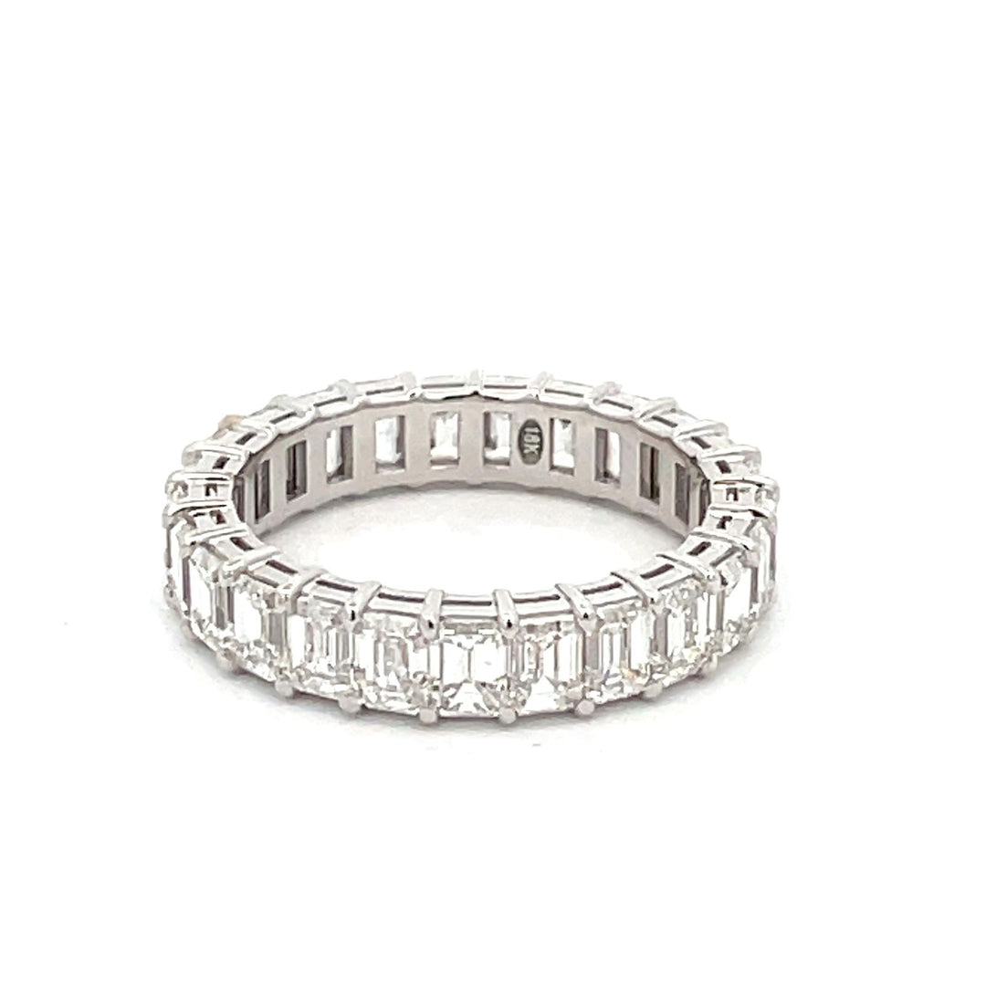 Eternity band in 18K WG with basket prong set emerald cut diamonds.  D3.62ct.t.w.  Size 5.75