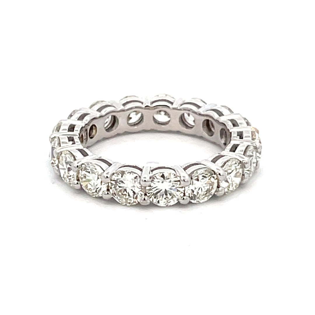 Eternity band in 18K WG with basket prong set (17) round diamonds.  D4.21ct.t.w.  Size 6.5