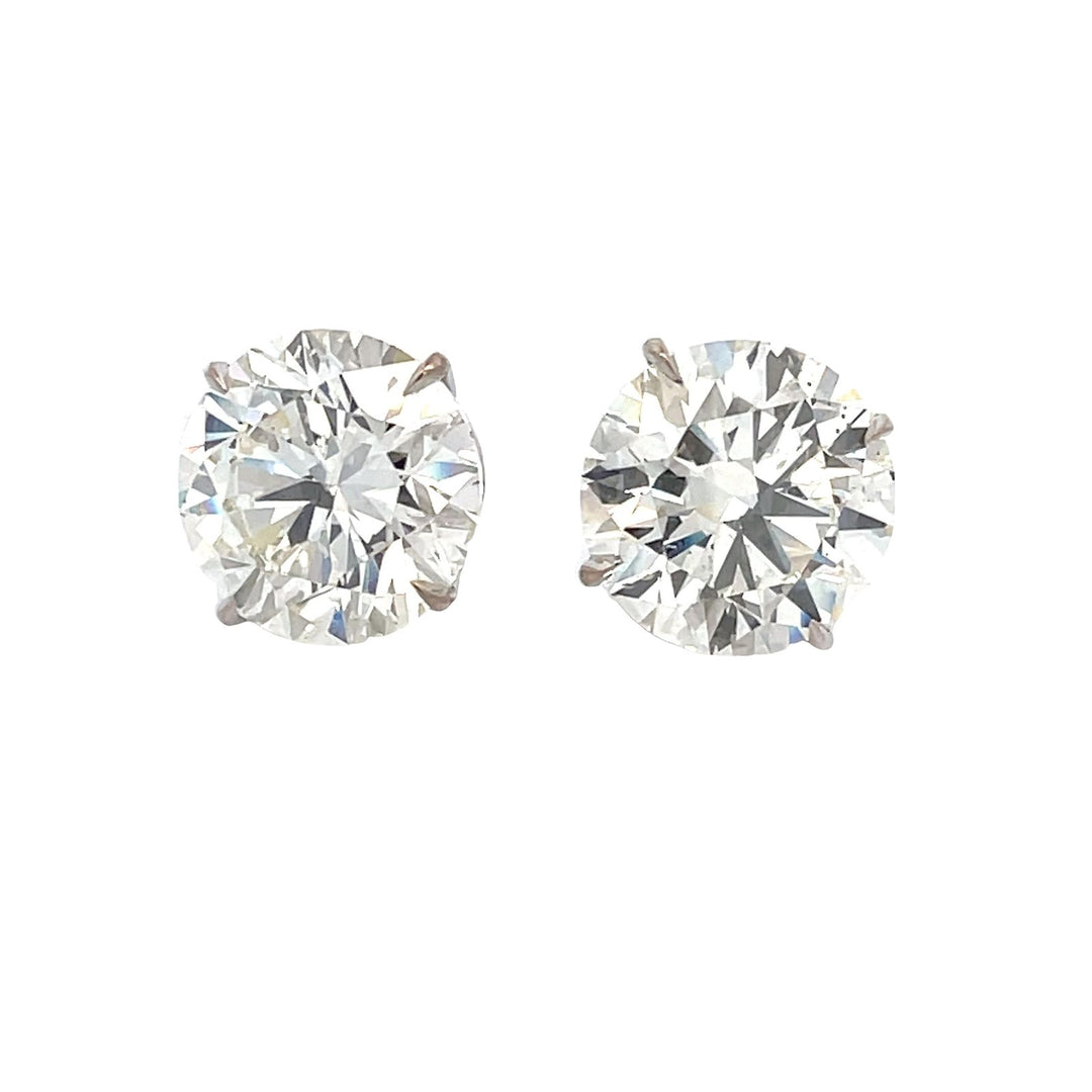 Push back stud earrings with basket prong set GIA certified L-M/SI1-SI2 round diamonds.  D16.28ct.t.w.