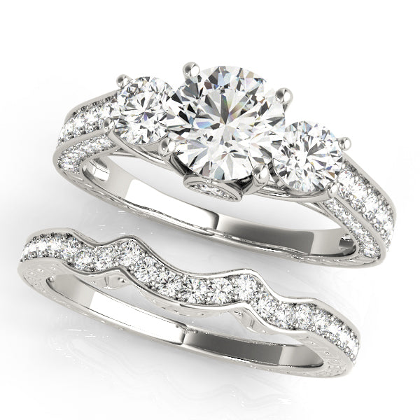 ENGAGEMENT RINGS 3 STONE ROUND